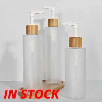 Skaidrus PET bambuko pompos losjono buteliukas Šampūno buteliukas Tuščias baltas plastikinis losjono butelis su bambuko pompa Mažmeninė ir didmeninė prekyba 300ml